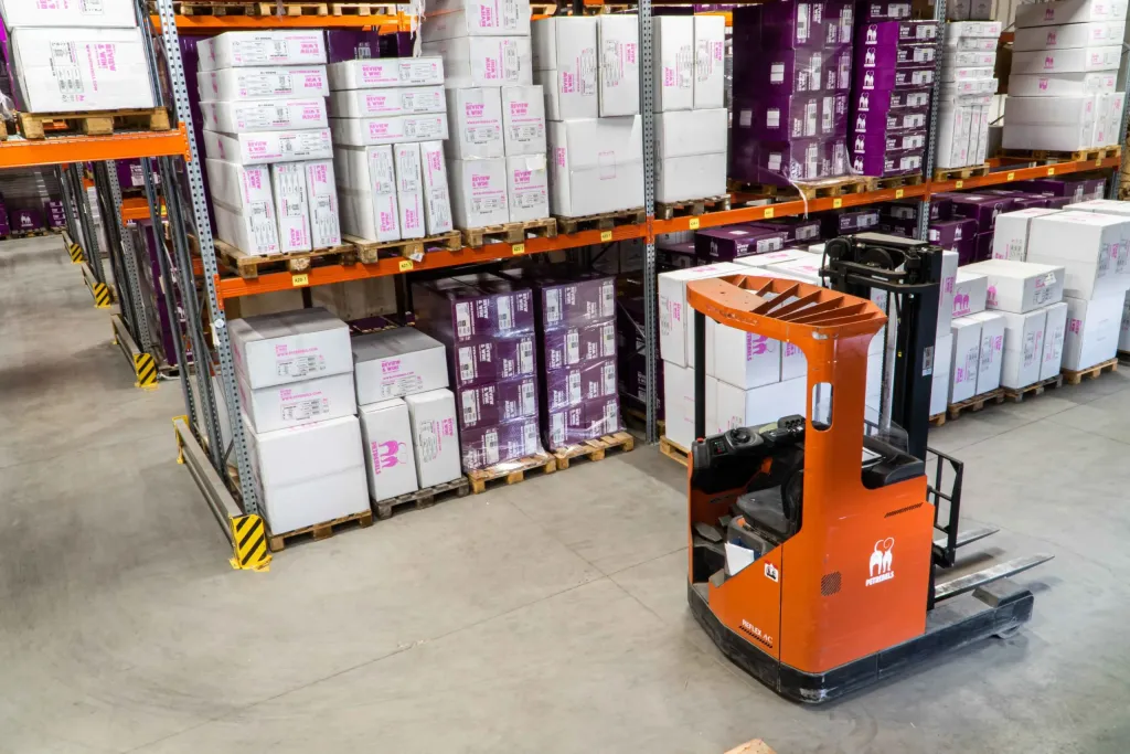 Forklift truck in warehouse
