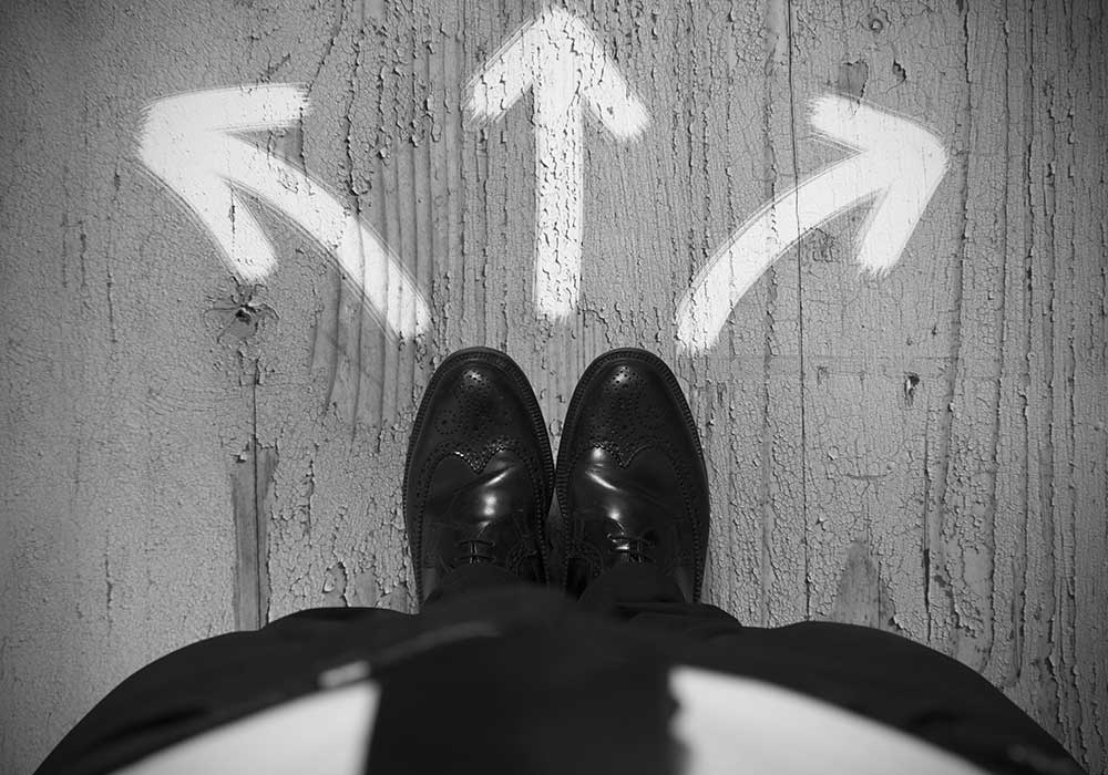 ERP Change Management - Shoes standing in front of arrows