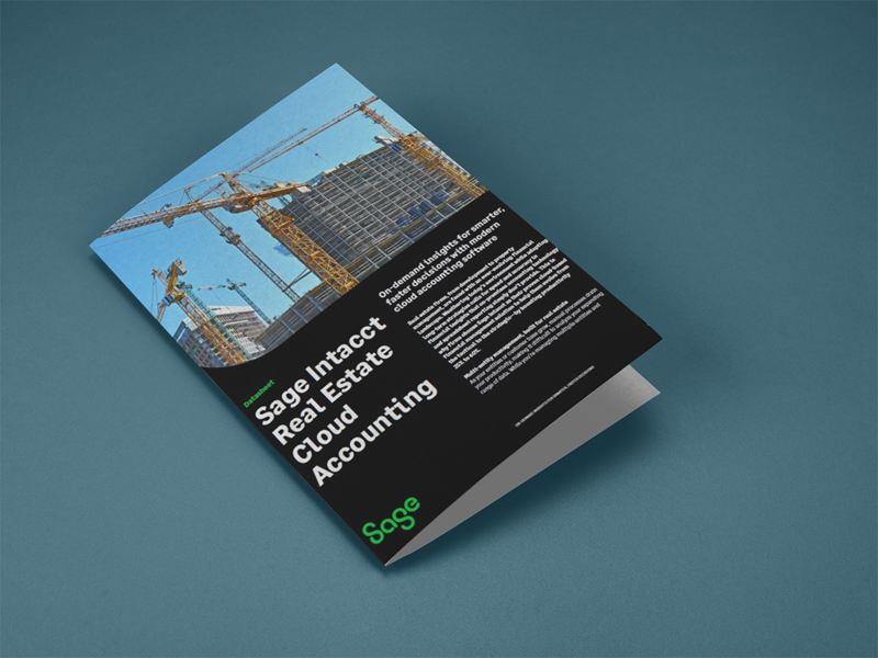 mockup of a bifold brochure lying on a solid colour surface
