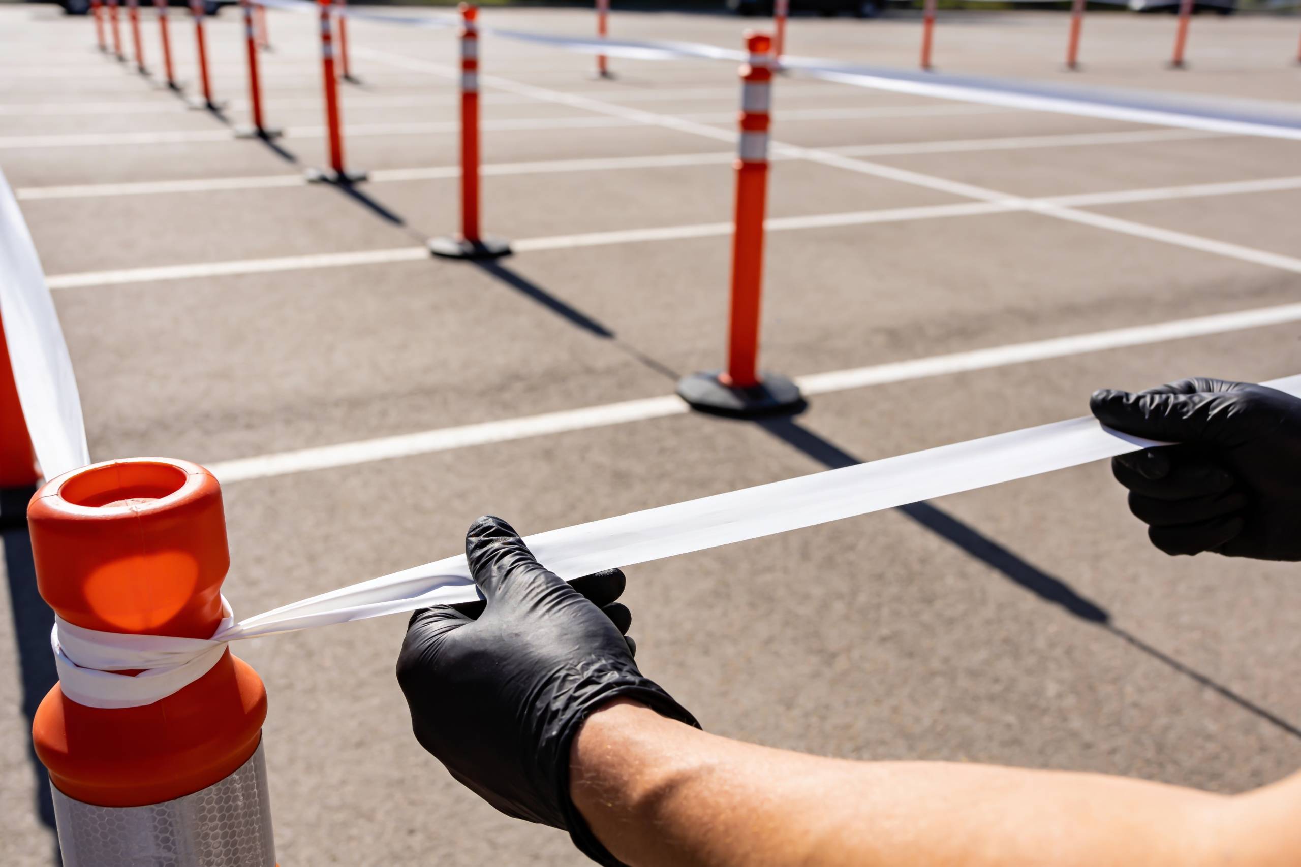 A,Person,Wearing,Black,Protective,Gloves,Is,Securing,A,White sage intacct event services