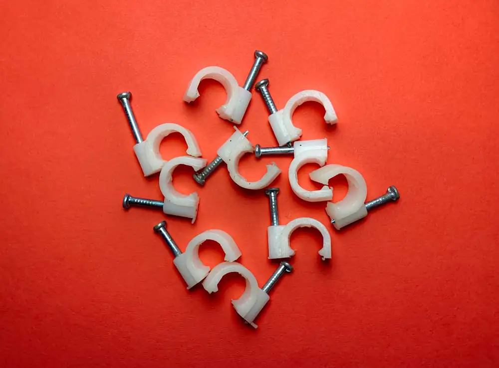 Talon-Manufacturing-Nail-in-Clips Nail in Clips on red background